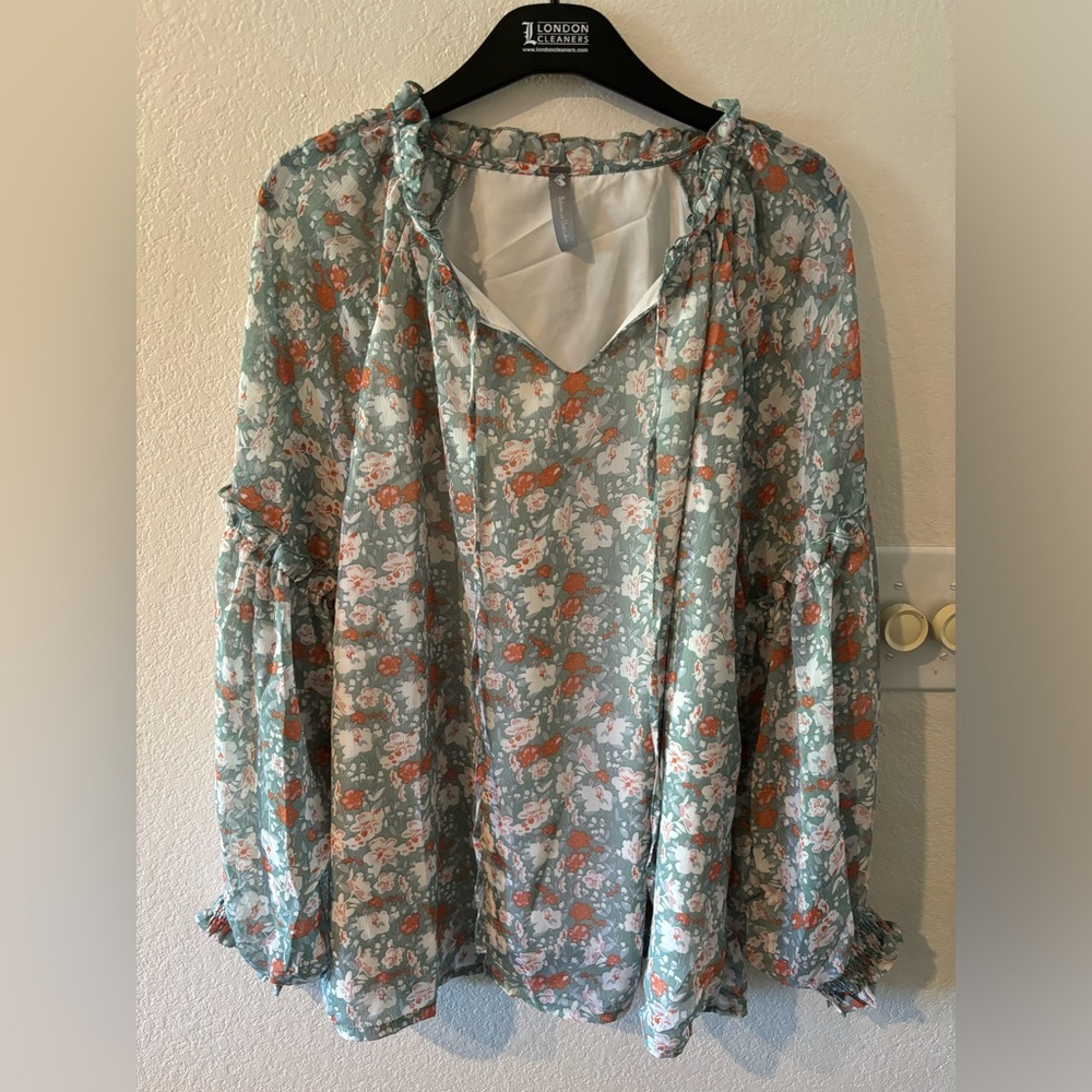 Bohemian fully lined soft green floral top